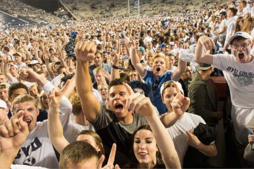 Rick Egan  |  The Salt Lake Tribune

Brigham Young fans storm the field as BYU upsets Boise State on two touchdowns in the last minute of play to beat the Broncos 35-24, in college football action, BYU vs. Boise State at Lavell Edwards Stadium, Saturday, September 12, 2015.
