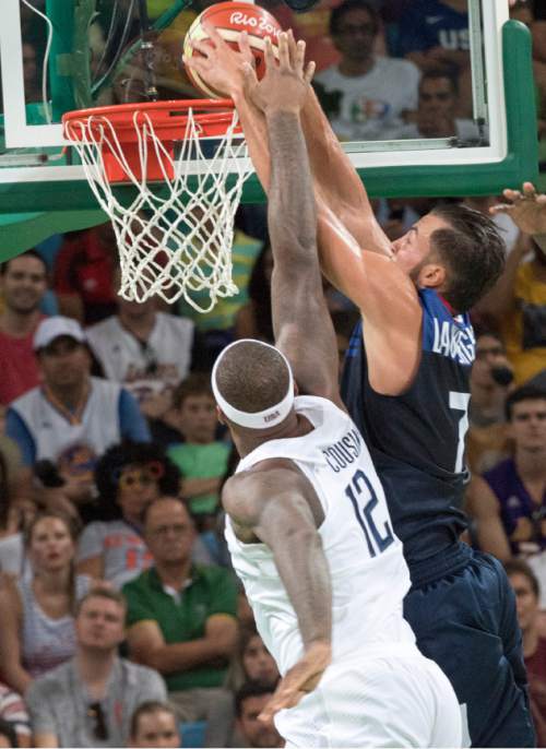 Rick Egan  |  The Salt Lake Tribune

Joffrey Lauvergne (7) of France gets past Demarcus Cousins (12) of United States, for a dunk, in Olympic basketball action, USA vs. France, in Rio de Janeiro Brazil, Sunday, August 14, 2016.