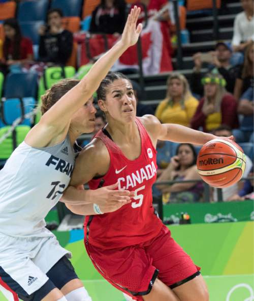 Rick Egan  |  The Salt Lake Tribune

Kia Nurse (5) of Canada tries to get to the basket as Gaelle Skrela (12) of France covers her tightly, in Olympic Women's basketball action in Rio de janeiro, Tuesday, August 16, 2016.