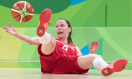 Rick Egan  |  The Salt Lake Tribune

Kim Gaucher (8) of Canada tries to keep control of the ball as she hits the floor, in Olympic Women's basketball action in Rio de janeiro, Tuesday, August 16, 2016.