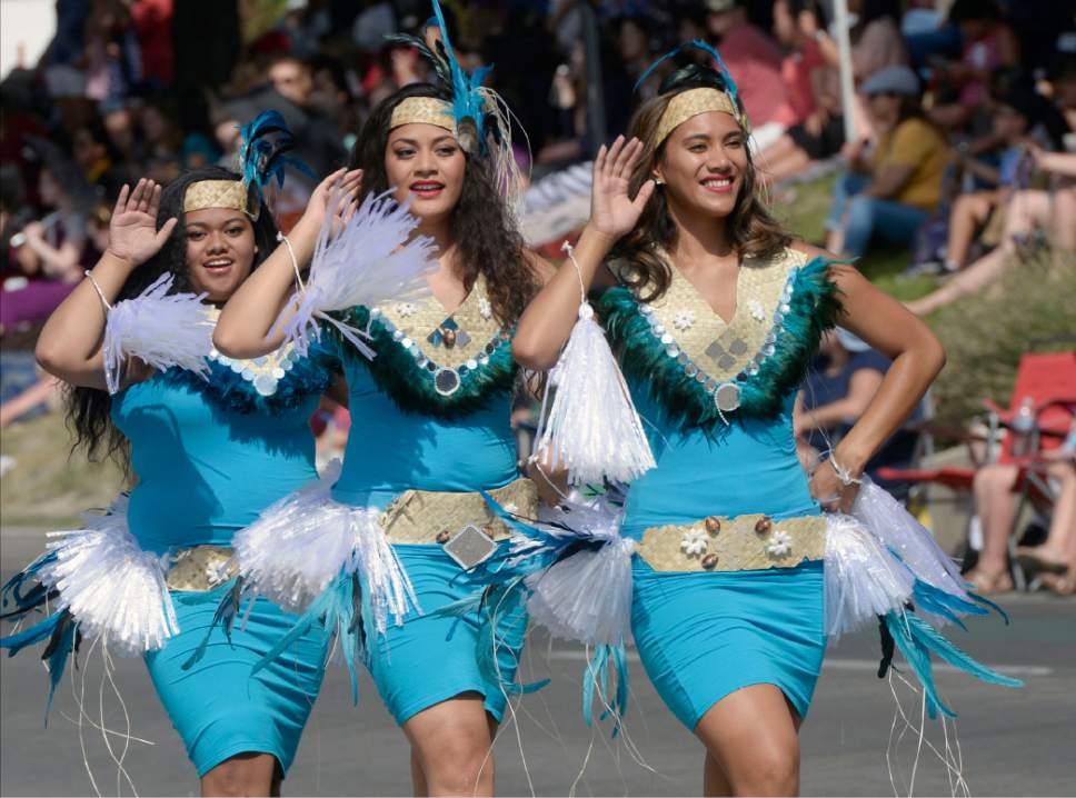 Al Hartmann  |  The Salt Lake Tribune 
Dancers in the Liahona Alumni Band march in the Day's of 47 parade in downtown Salt Lake City Monday July 25 celebrating Utah's heritage and spirit.