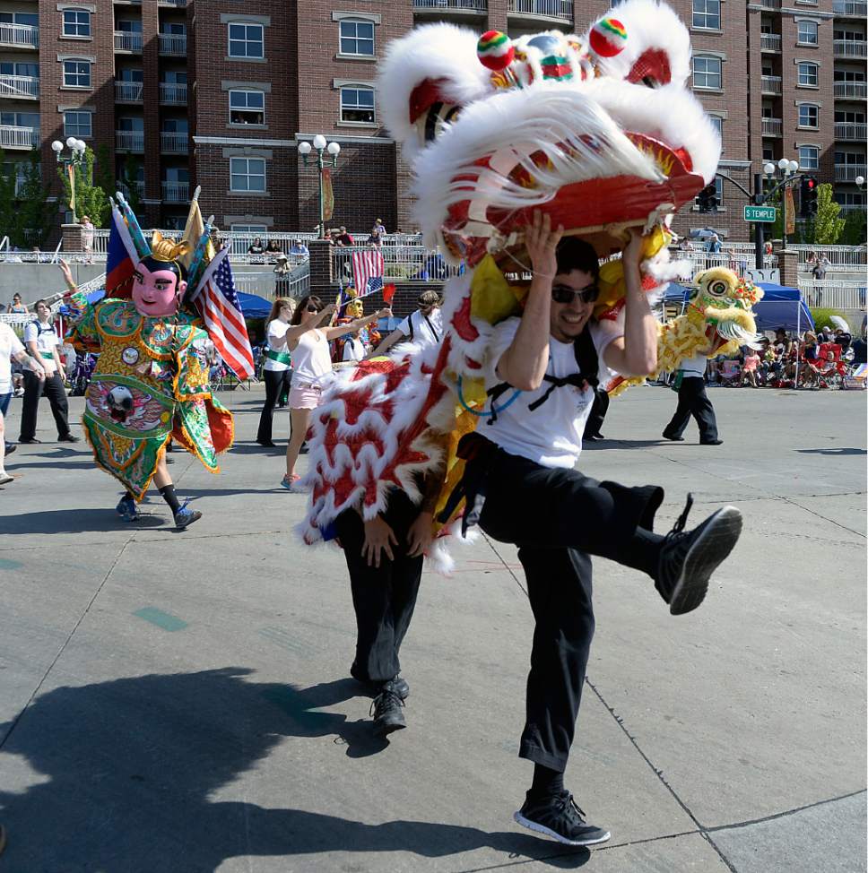 Al Hartmann  |  The Salt Lake Tribune 
Chinese Socity of Utah march in the Day's of 47 parade in downtown Salt Lake City Monday July 25 celebrating Utah's heritage and spirit.