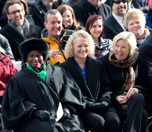 Steve Griffin  |  Tribune file photo
Salt Lake Mayor Jackie Biskupski, laughs with herthen-fiancee Betty Iverson, right, and Salt Lake County Presiding Judge, Shauna Graves-Robertson, left, during Oath of Office Ceremony for her and council members Andrew Johnston, Derek Kitchen and Charlie Luke at the City & County Building in Salt Lake City, Monday, January 4, 2016.
