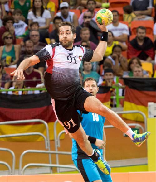 Rick Egan  |  The Salt Lake Tribune

Mohammad Sanad (91) of Egypt takes a shot in handball action, Egypt vs. Germany, at the Future Arena, in Rio de Janeiro, Monday, August 15, 2016.