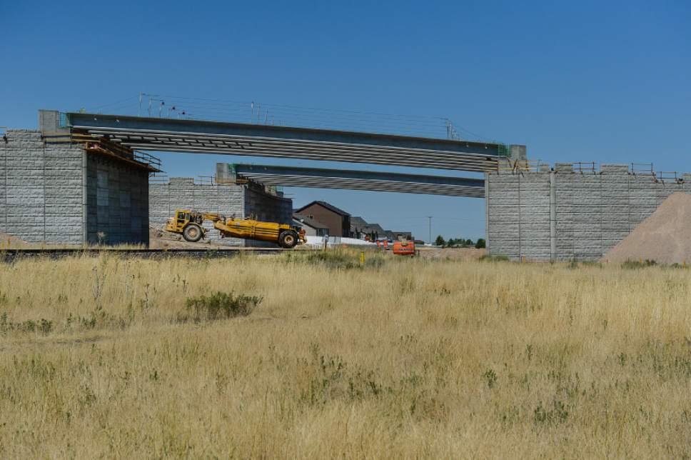 Francisco Kjolseth | The Salt Lake Tribune
Work is ongoing for the extension of the new Mountain View Corridor highway near 4700 S. 5800 W. in West Valley City on Tuesday, Aug. 16, 2016.