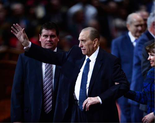 Scott Sommerdorf   |  The Salt Lake Tribune  
President Thomas S. Monson waves goodbye as he leaves the end of the afternoon session of the 186th annual General Conference of the LDS Church, Sunday, April 3, 2016.