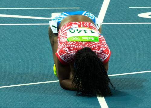 Rick Egan  |  The Salt Lake Tribune

Jasmine Camacho-Quinn, Puerto Rico,  falls to the ground at the finish line, after he triped over a hurdle near the end of the 100-meter hurdles semi-final at Olympic Stadium in Rio de Janeiro, Wednesday, August 17, 2016.