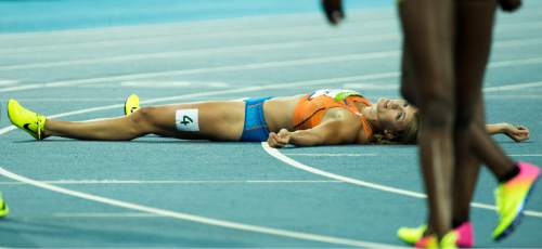 Rick Egan  |  The Salt Lake Tribune

Dafne Schippers of the Netherland's, lies on the track after falling down at the finish line in second place at 21.88, finishing behind Jamaica's Elaine Thompson, who won gold at 21.78, at Olympic Stadium, in Rio de Janeiro, Wednesday, August 17, 2016.