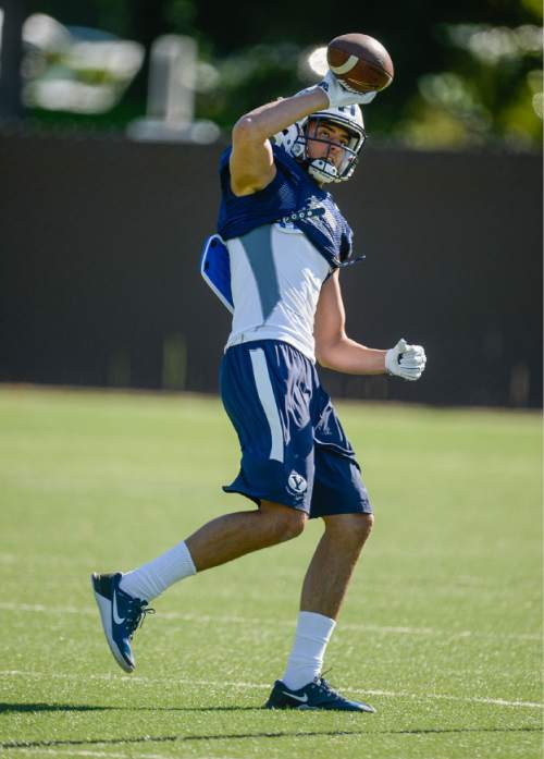 Francisco Kjolseth | The Salt Lake Tribune
BYU's wide receiver, No. 5 Nick Kurtz eases back in to things following a broken foot during practice on Tuesday, Aug. 16, 2016.