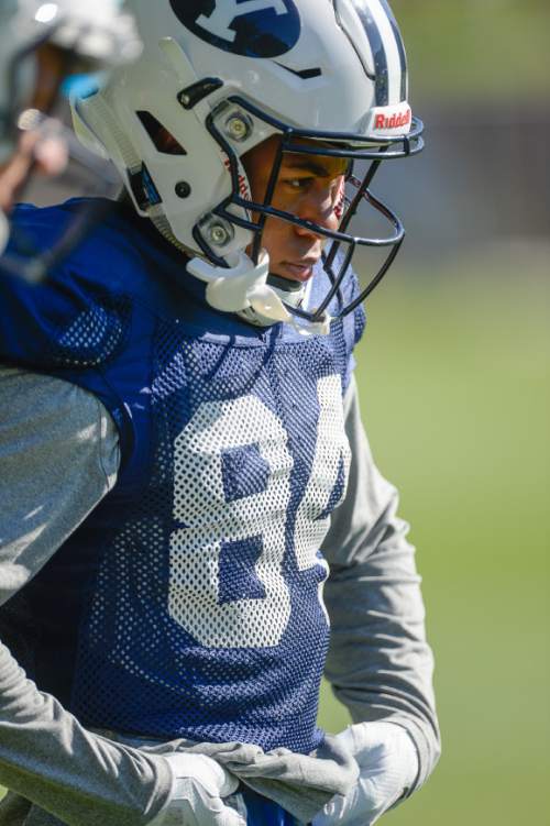 Francisco Kjolseth | The Salt Lake Tribune
BYU wide receiver No. 84 Jonah Trinnaman hits the practice field with the rest of the team on Tuesday, Aug. 16, 2016.