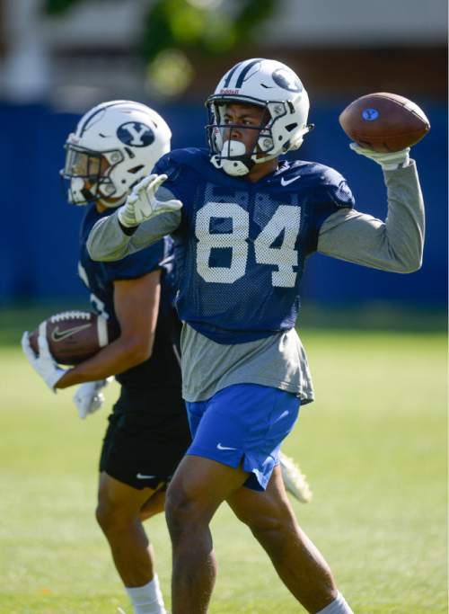 Francisco Kjolseth | The Salt Lake Tribune
BYU wide receiver No. 84 Jonah Trinnaman hits the practice field with the rest of the team on Tuesday, Aug. 16, 2016.