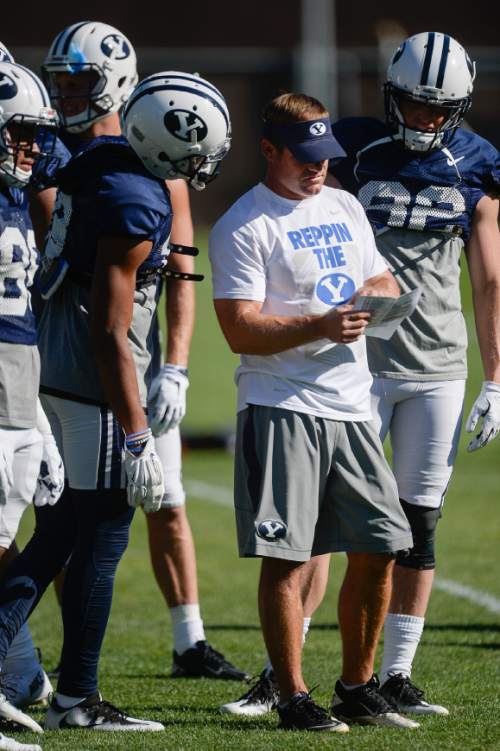 Francisco Kjolseth | The Salt Lake Tribune
BYU's receiving corps, led by new wide receiver coach Ben Cahoon, take to the practice field on Tuesday, Aug. 16, 2016.