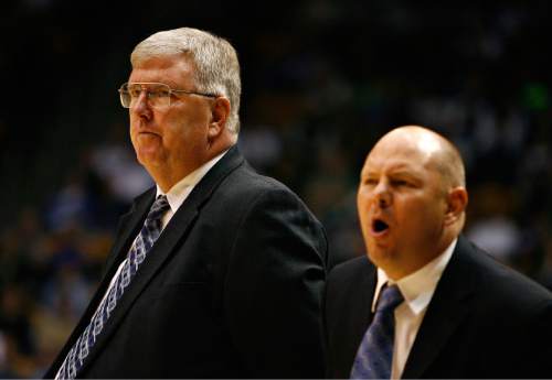Djamila Grossman  |  The Salt Lake Tribune

Utah State University's coaches Stew Morrill and Chris Jones react to the play at a game against Brigham Young University in Provo, Thursday, Nov. 17, 2010. Jones is expected to be announced as Utah's newest director of basketball operations.