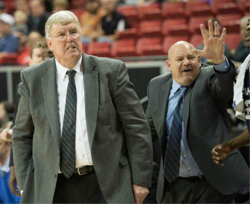 Rick Egan  |  The Salt Lake Tribune

Utah State head coach Stew Morrill and assistant Chris Jones react as Wyoming appeared to have more than 5 seconds to inbound the ball in the final seconds of the game in Mountain West Conference Basketball Championship action, Utah State vs. Wyoming, at the Thomas & Mack Center in Las Vegas, Thursday, March 12, 2015.