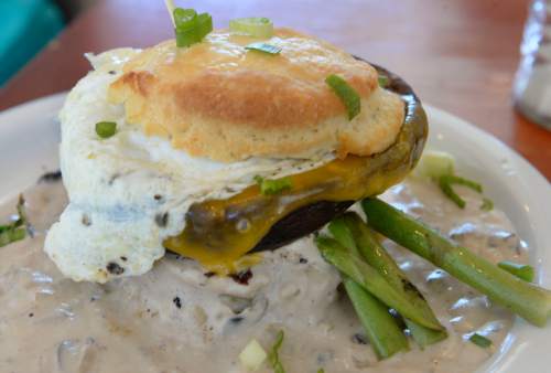 Al Hartmann  |  The Salt Lake Tribune 
 "T-Rose" biscuit with large portabella mushroom, egg, asparagus, cheddar and mushroom gravy at Sweet Lake Limemade and Biscuits.
