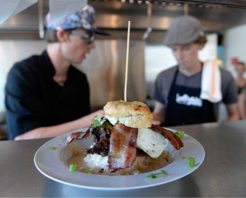 Al Hartmann  |  The Salt Lake Tribune 
Line chefs cook everything from scratch including "The Hoss," a fresh biscuit with fried-chicken breast, egg, bacon, cheddar and sausage gravy at Sweet Lake Limeade and Biscuits.