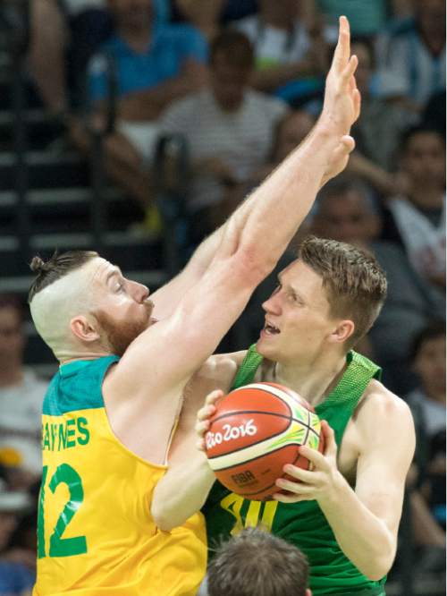 Rick Egan  |  The Salt Lake Tribune

Marius Grigonis (40) of Lithuania tries to shoot over Aron Baynes (12) of Australia defends for Australia, in Olympic basketball action, at Carioca Arena, in Rio de Janeiro, Monday, August 15, 2016.