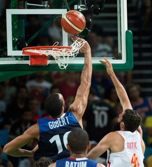 Rick Egan  |  The Salt Lake Tribune

Rudy Gobert (16) of France gets his hand stuck in the net, as he tries to stop a shot by Nikola Mirotic (44) of Spain, in mens Olympics quarterfinal basketball action, France vs.Spain, at Carioca Arena, in Rio de Janeiro, Monday, August 15, 2016.