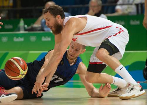 Rick Egan  |  The Salt Lake Tribune

Kim Tillie (17) of France goes for the ball along with Sergio Rodriguez (6) of Spain, in mens Olympics quarterfinal basketball action, France vs.Spain, at Carioca Arena, in Rio de Janeiro, Monday, August 15, 2016.