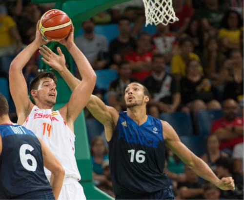 Rick Egan  |  The Salt Lake Tribune

Guillermo Hernangomez Geuer (14) of Spain grabs a rebound, as Rudy Gobert (16) defends for France, in mens Olympics quarterfinal basketball action, France vs.Spain, at Carioca Arena, in Rio de Janeiro, Monday, August 15, 2016.