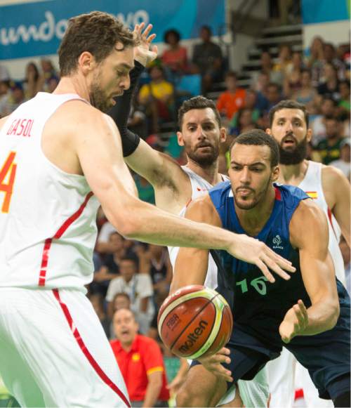Rick Egan  |  The Salt Lake Tribune

Rudy Gobert (16) of France has the ball knocked free by Pau Gasol (4) of Spain, in mens Olympics quarterfinal basketball action, France vs.Spain, at Carioca Arena, in Rio de Janeiro, Monday, August 15, 2016.