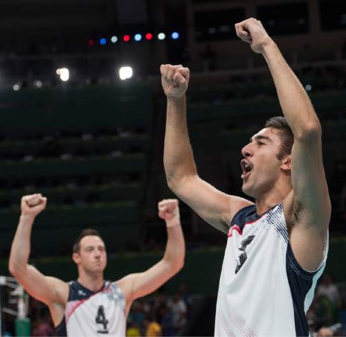 Rick Egan  |  The Salt Lake Tribune

David Lee (4) and Taylor Sander (3) of the United States celebrate their 3-1 win over France, in Olympic volleyball action at the Maracanãzinho Arena, in Rio de Janeiro Brazil, Saturday, August 13, 2016.