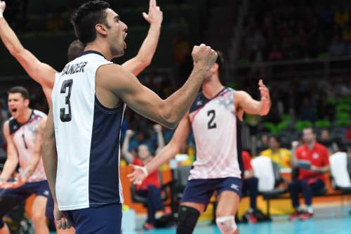 Rick Egan  |  The Salt Lake Tribune

Taylor Sander (3) and David Lee (4) of United States celebrate as the US team closes in on a win in game 4, in volleyball action USA vs. Brazil, in Rio de Janeiro, Thursday, August 11, 2016.