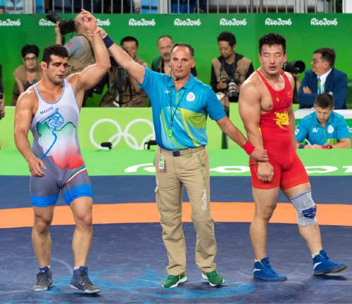 Rick Egan  |  The Salt Lake Tribune

Iranian Ghasem Rezaei defeats China's Di Xiao in men's Greco-Roman 98 kg weight class at Carioca 2 Arena, at the Olympic Games in Rio de Janeiro, Tuesday, August 16, 2016.