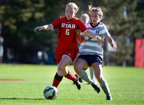 Scott Sommerdorf   |  The Salt Lake Tribune
Utah's Paola Van Der Even battles with USU's Wesley Hamblin during first half play. Utah State beat Utah 2-0 in women's soccer at Utah, Friday, September 18, 2015.