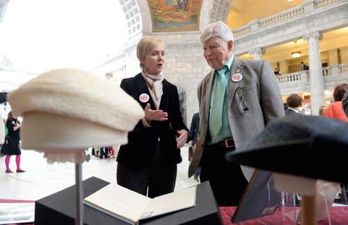 Al Hartmann  |   Tribune file photo

Julie Fisher, Director of Department of Heritage and Arts, shows Fred Adams, Director of the Utah Shakespeare Festival a vintage hat collection from former lawmaker Alice Merrill who started the Utah Arts Council, the oldest of its kind in the United States.