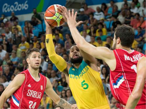 Rick Egan  |  The Salt Lake Tribune

Patty Mills (5) of Australia, tries to get the ball past Stefan Jovic (24) of Serbia add ss10/basketball action, Australia vs. Serbia, at Carioca arena, in Rio de Janeiro, Friday, August 19, 2016.