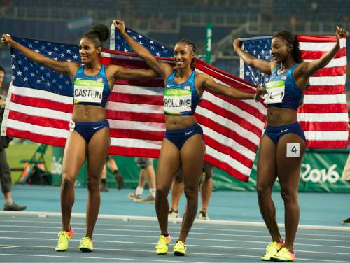 Rick Egan  |  The Salt Lake Tribune

Brianna Rollins, Nia Ali and Kristi Castlin swept the podium in the women's 100-meter hurdles on Wednesday at Olympic Stadium.

Rollins won gold with a time of 12.48. Ali ran a 12.59 to win silver. Castlin was right behind at 12.61 to win bronze.

This is the first time ever the U.S. has swept the podium in women's 100-meter hurdles, which was introduced at the Munich 1972 Olympic Games. Wednesday, August 17, 2016.