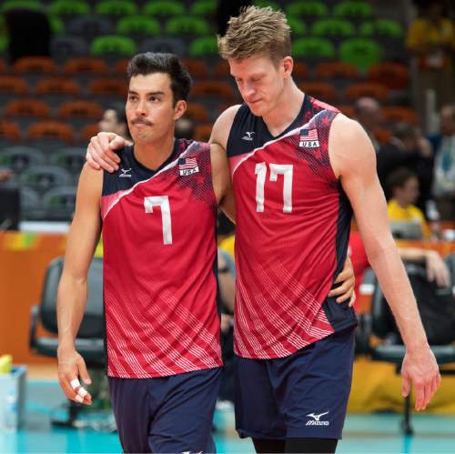 Rick Egan  |  The Salt Lake Tribune

Kawika Shoji (7) of United States and Maxwell Holt (17) of United States walk off the court after losing to Italy 2-3, in mens volleyball, at Maracanãzinho arena, in Rio de Janeiro, Friday, August 19, 2016.