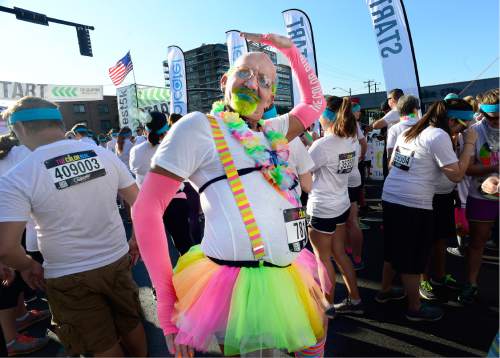Scott Sommerdorf   |  The Salt Lake Tribune  
Jeff Seegmiller posed at the starting line of the Color Run, billed as "the largest 5K event series in the world" brought its 2016 tour theme, "The Color Run Tropicolor World Tour" to Salt Lake City, Saturday, August 20, 2016.