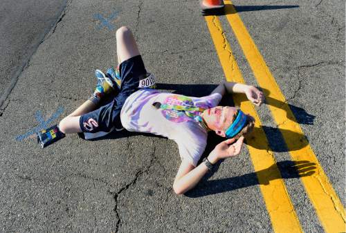 Scott Sommerdorf   |  The Salt Lake Tribune  
The second runner to finish the race collapsed after the finish line at the Color Run, billed as "the largest 5K event series in the world" brought its 2016 tour theme, "The Color Run Tropicolor World Tour" to Salt Lake City, Saturday, August 20, 2016.