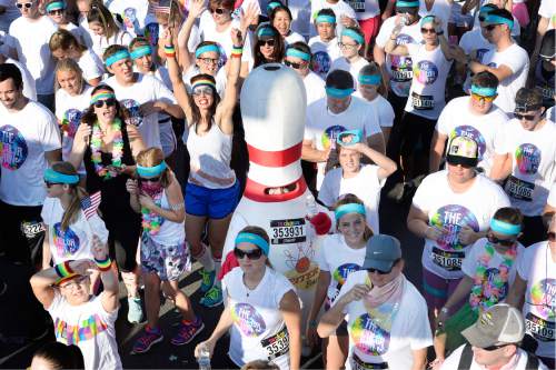 Scott Sommerdorf   |  The Salt Lake Tribune  
Runners - including one dressed as a bowling pin - started out in the first wave at the Color Run, billed as "the largest 5K event series in the world" brought its 2016 tour theme, "The Color Run Tropicolor World Tour" to Salt Lake City, Saturday, August 20, 2016.