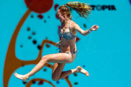 Chris Detrick  |  The Salt Lake Tribune
A woman launches off a ramp into the one million gallon pool during Slip n' Soar at Utah Olympic Park Saturday August 20, 2016.