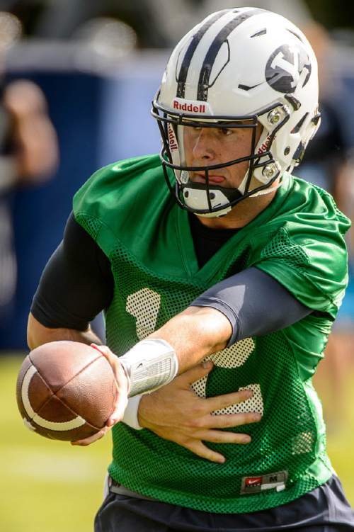 Trent Nelson  |  The Salt Lake Tribune
BYU quarterback Tanner Mangum at the first BYU fall camp practice under new coach Kalani Sitake, Friday August 5, 2016 in Provo.