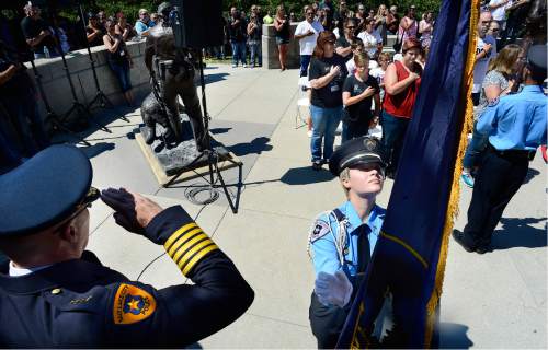 Scott Sommerdorf   |  The Salt Lake Tribune  
Salt lake City Police Department Explorers from Explorer Post #2471 bring in the colors at the beginning of the pinning ceremony at the Utah Law Enforcement Memorial "Ride for the Fallen", Sunday, August 21, 2016.