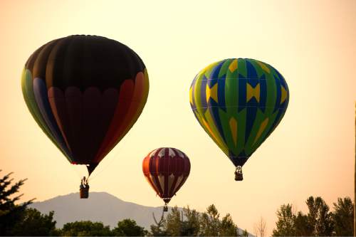 Leah Hogsten  |  The Salt Lake Tribune
Hot air balloons took to the skies early Friday, August 19, 2016 to kick off the Ogden Valley Balloon Festival, today through Sunday in Eden Park. The event features approximately 15 hot air balloons which are the focus for 5 launches and one balloon glow throughout the weekend.