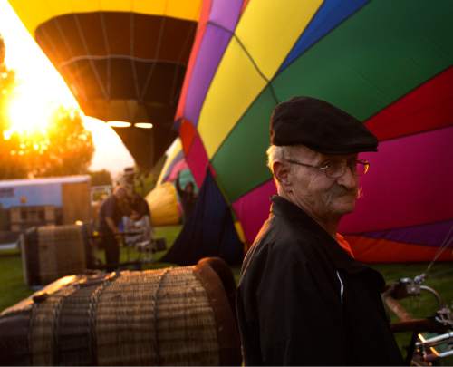 Leah Hogsten  |  The Salt Lake Tribune
JP Price with "The Wild Thing" hot air balloon will follow his crew in the even they need assistance from the support vehicle. Hot air balloons took to the skies early Friday, August 19, 2016 to kick off the Ogden Valley Balloon Festival, today through Sunday in Eden Park. The event features approximately 15 hot air balloons which are the focus for 5 launches and one balloon glow throughout the weekend.