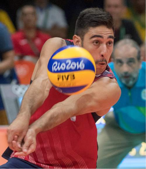 Rick Egan  |  The Salt Lake Tribune

Taylor Sander (3) hits the ball for the USA, in mens volleyball, at Maracanãzinho arena, in Rio de Janeiro, Friday, August 19, 2016.