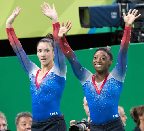 Rick Egan  |  The Salt Lake Tribune

Aly Raisman, and Simone Biles wave to the crowd after winning the Gold and Silver Medals on the Floor for USA, in Olympic Artistic Gymnastics,  in Rio de Janeiro, Monday, August 15, 2016.

Gold	
Simone Biles
	United States
15.966
Silver	
Aly Raisman
	United States
15.500
Bronze	
Amy Tinkler
	Great Britain