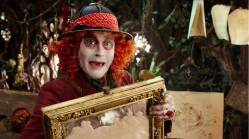 In this image released by Disney, Johnny Depp portrays the Hatter in a scene from "Alice Through The Looking Glass." The film, opening on the heels of domestic abuse allegations against its star, Johnny Depp, saw one of the steepest drops ever from its predecessor. It made a staggering $740 million less than the 2010 original. (Disney via AP)