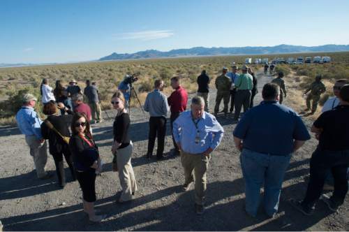 Steve Griffin / The Salt Lake Tribune

Participants in the S/K Challenge event wait for a blast that will release a chemical that will replicate a chemical weapon at Target S at the Dugway Proving Ground's in Dugway Wednesday August 24, 2016 as part of the event that offers an opportunity for foreign, U.S. government, military and private industry to challenge their chemical and biological defense technologies with simulated threats during a two week period. i