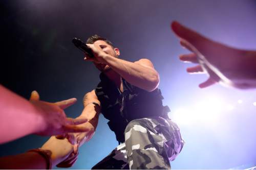 Leah Hogsten  |  The Salt Lake Tribune
The reunited '90s boy band 98 Degrees -- made up of brothers Nick and Drew Lachey, Justin Jeffre and Jeff Timmons -- bring their MY2K Tour to the Maverik Center in West Valley City on Tuesday, August 23, 2016. Fellow boy band O-Town, pop-rock singer Ryan Cabrera and girl band Dream also performed.