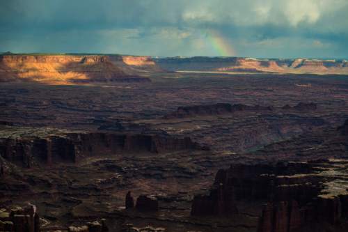 Chris Detrick  |  The Salt Lake Tribune
A rainbow appears in the distance as seen from Grand View Point in the Island in the Sky District at Canyonlands National Park Wednesday August 24, 2016.
