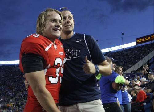 Rick Egan  | The Salt Lake Tribune 

Utah Utes kicker Andy Phillips (39) poses with his missionary buddy, Kyle Carlson, Ogden, BYU faced The University of Utah game, at Lavell Edwards Stadium, Saturday, September 21, 2013. Phillips and Carlson served in Norway together.