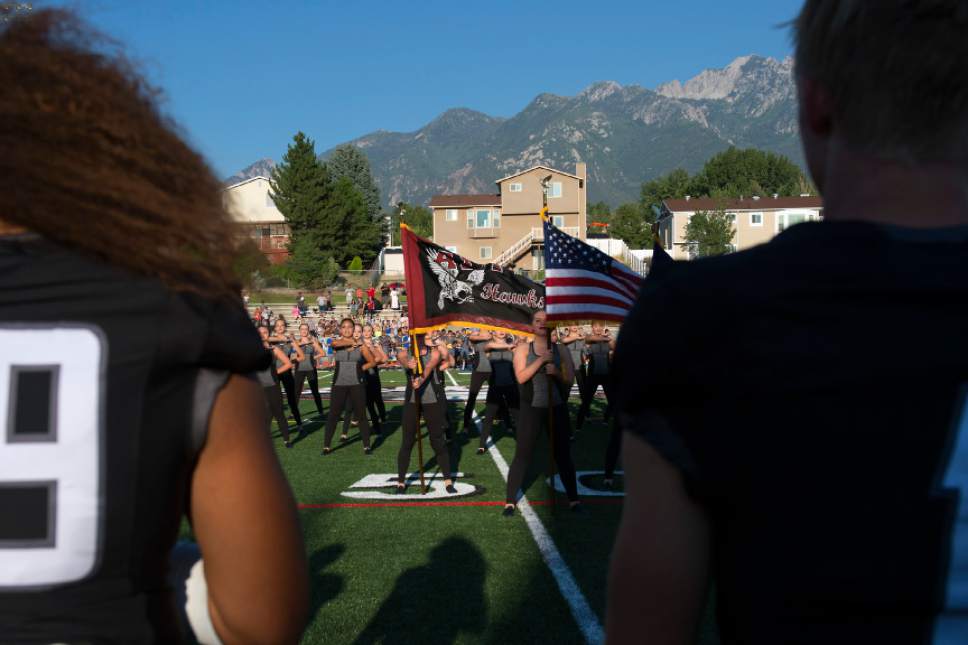 Chris Detrick  |  The Salt Lake Tribune
The Pledge of Allegiance is recited before the game against Taylorsville at Alta High School Friday August 19, 2016.