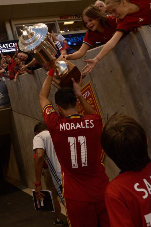 Leah Hogsten  |  The Salt Lake Tribune
Real Salt Lake midfielder Javier Morales (11) celebrates winning the Rocky Mountain Cup with fans as he leaves the field. Real Salt Lake defeated the Colorado Rapids 2-1 during their Rocky Mountain Championship Cup game at Rio Tinto Stadium Friday, August 26, 2016.